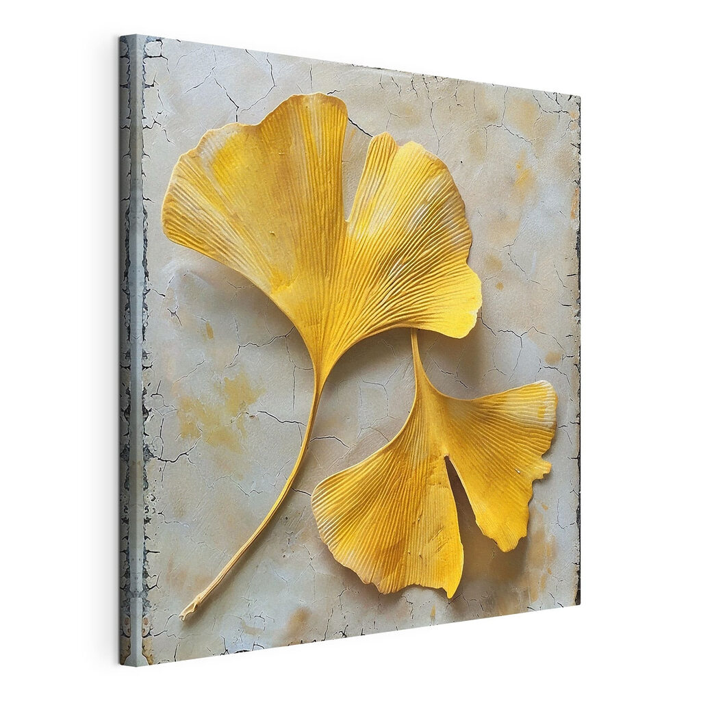 Yellow leaves on a white surface