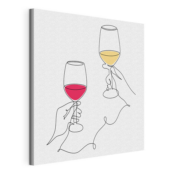 A hand holding wine glasses A hand holding wine glasses