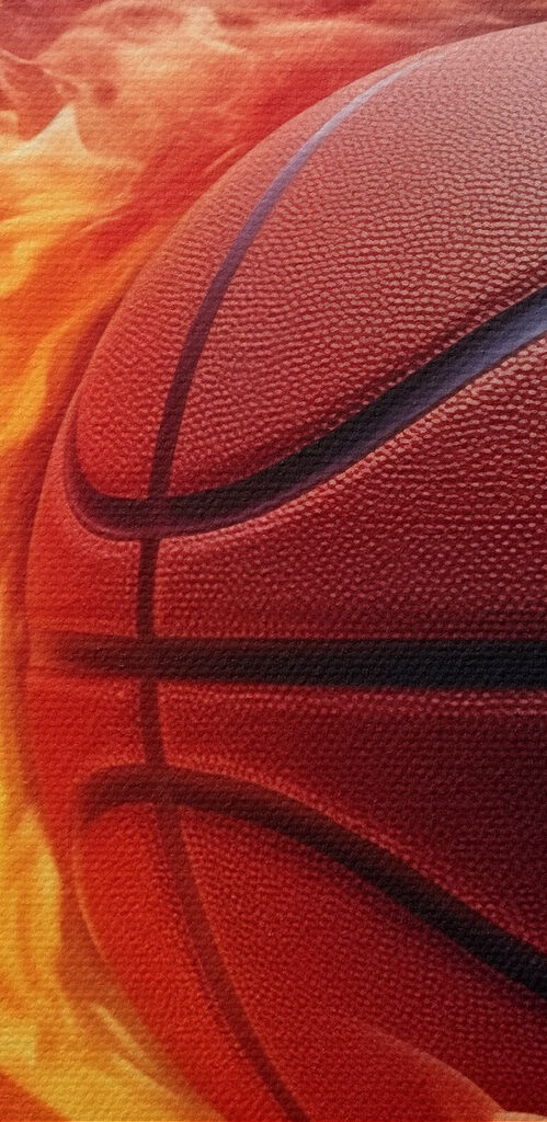 Basketball in flames on a black background