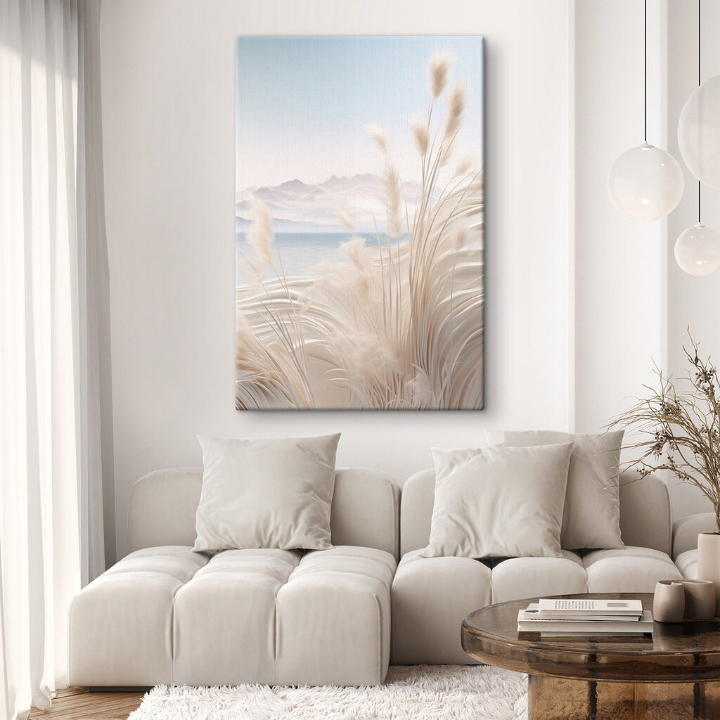 White grass with a mountain in the background