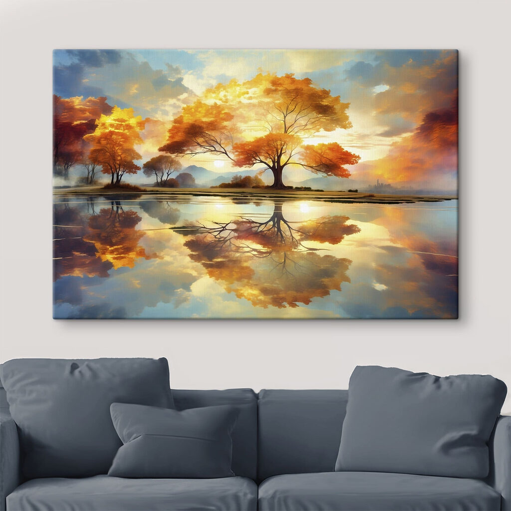 Tree with yellow leaves on the ground and a body of water Tree with yellow leaves on the ground and a body of water