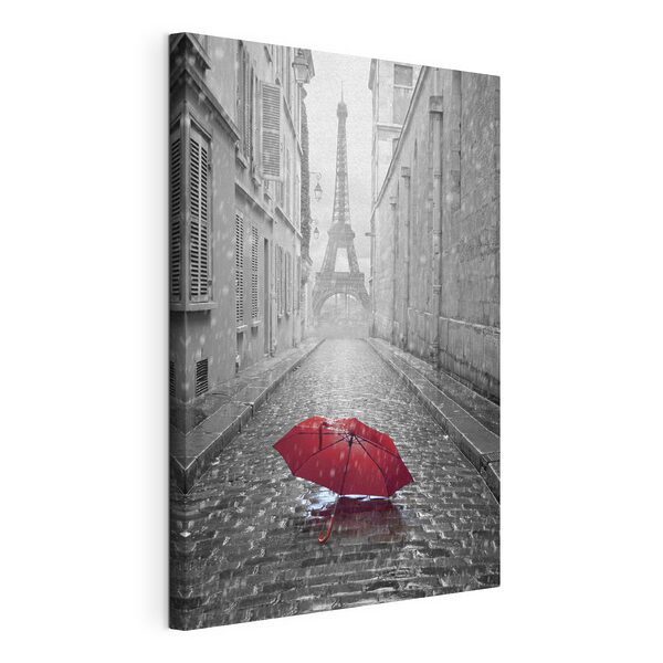Un parapluie rouge dans une rue avec une tour en arrière-plan Tableaux Un parapluie rouge dans une rue avec une tour en arrière-plan