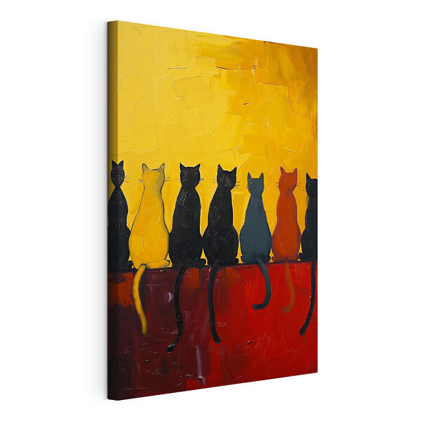 A group of cats sitting on a red surface