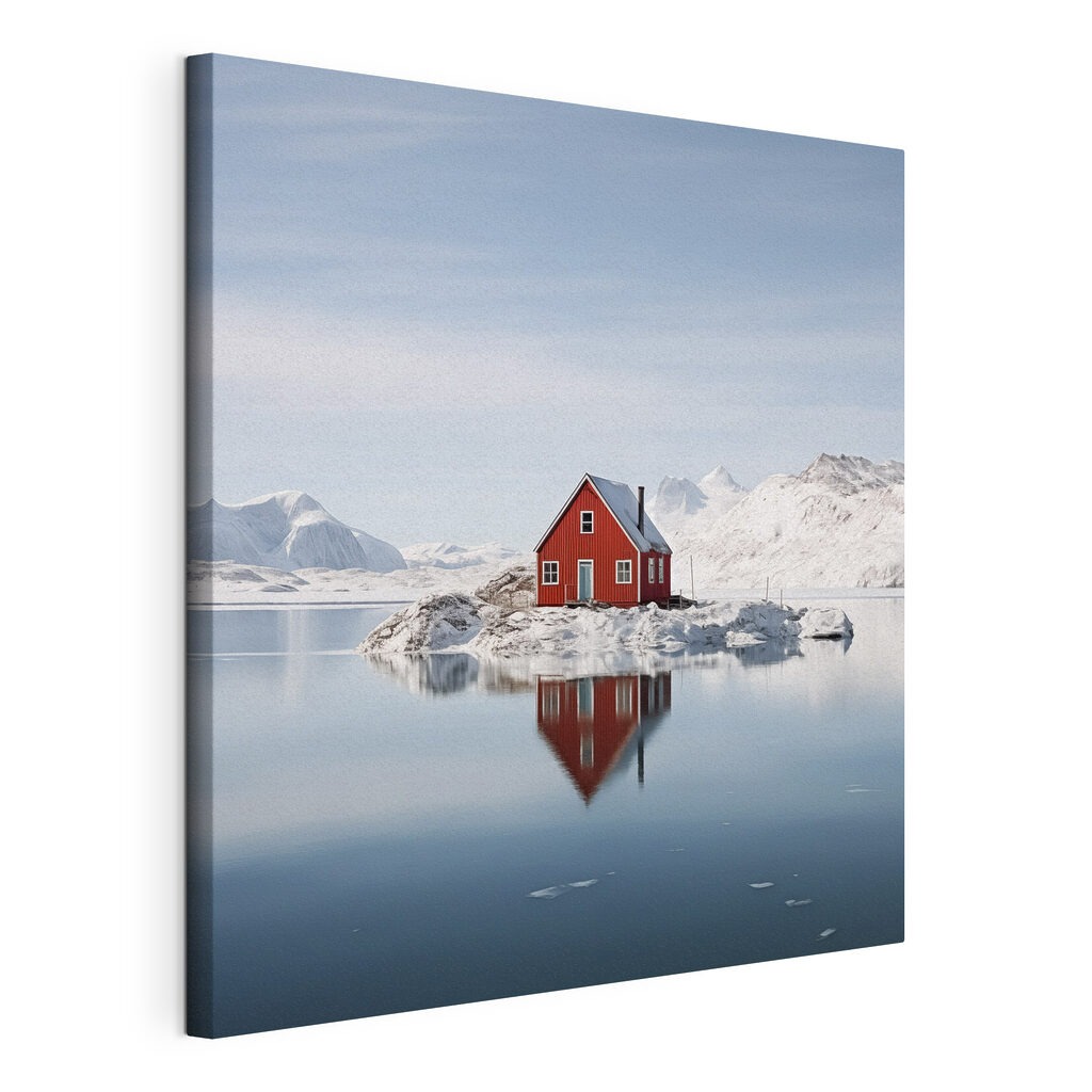 Red house on an island in water with snow covered mountains in the background