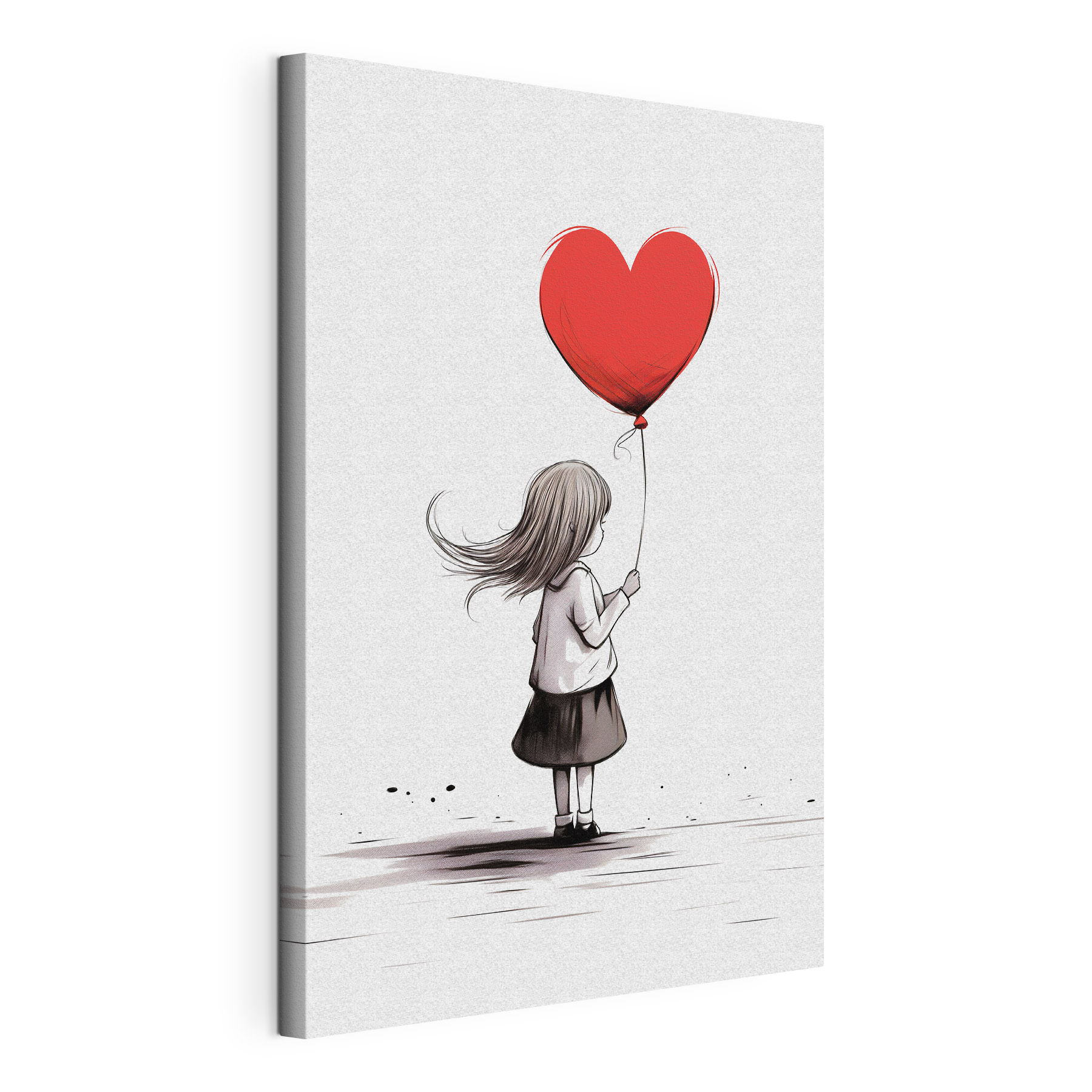 Girl holding a heart shaped balloon