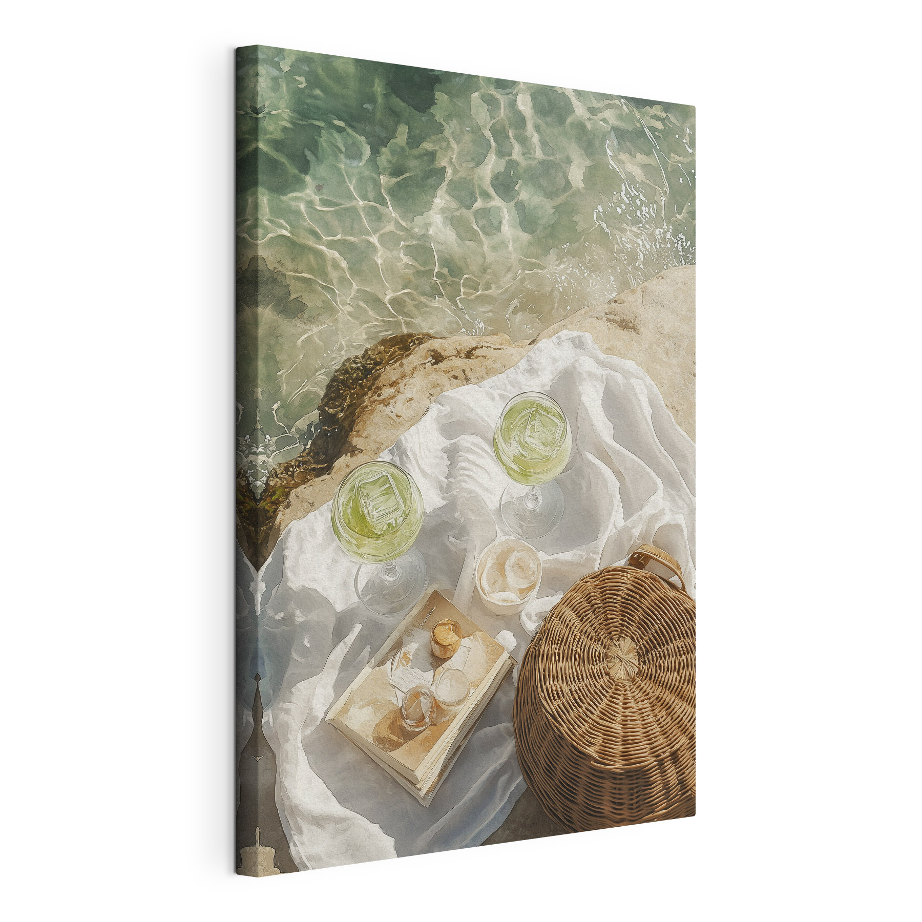 Picnic basket and glasses of wine on a rock by water