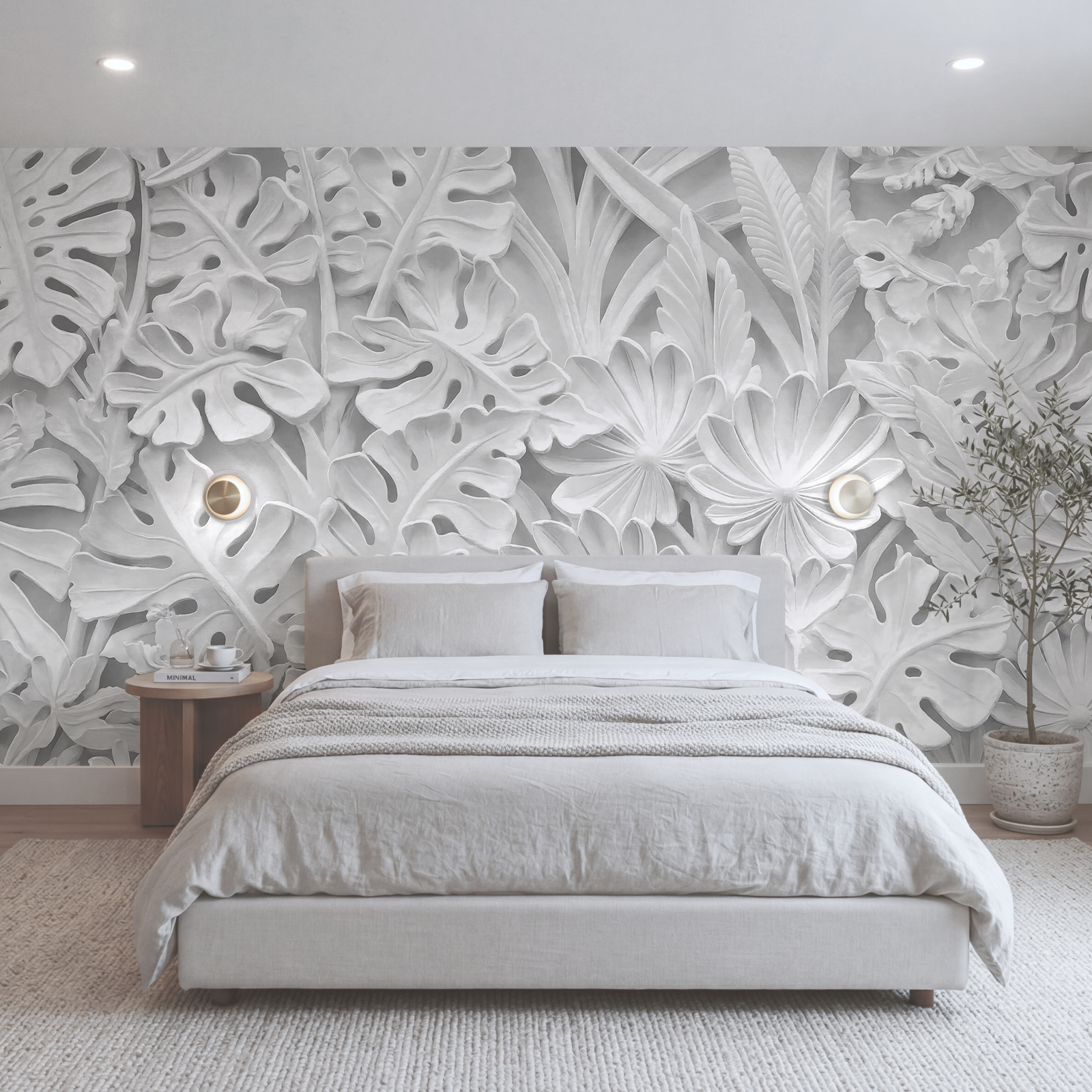 Mur blanc orné de fleurs et de feuilles Mur blanc orné de fleurs et de feuilles