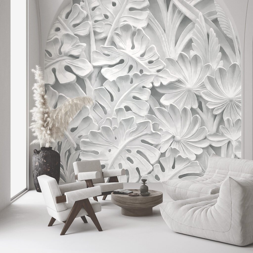 Mur blanc orné de fleurs et de feuilles Mur blanc orné de fleurs et de feuilles