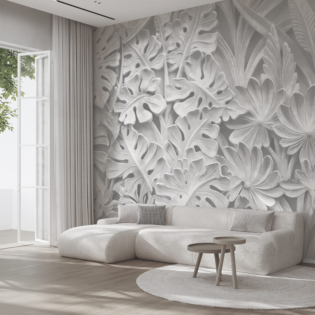 Mur blanc orné de fleurs et de feuilles Mur blanc orné de fleurs et de feuilles