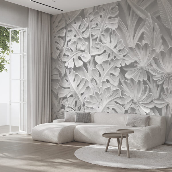 Mur blanc orné de fleurs et de feuilles Mur blanc orné de fleurs et de feuilles