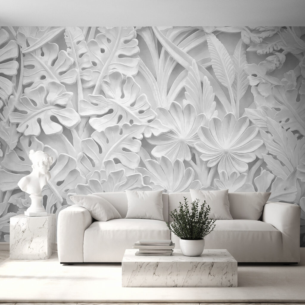 Mur blanc orné de fleurs et de feuilles Mur blanc orné de fleurs et de feuilles