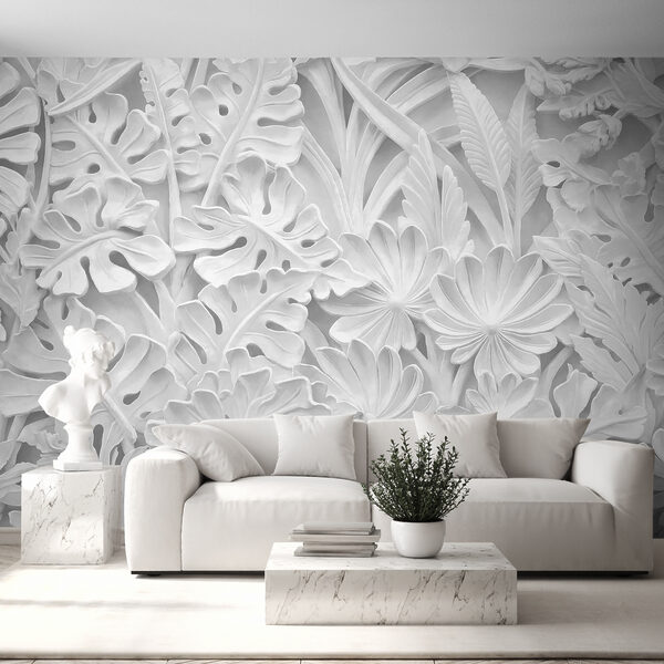 Mur blanc orné de fleurs et de feuilles Mur blanc orné de fleurs et de feuilles