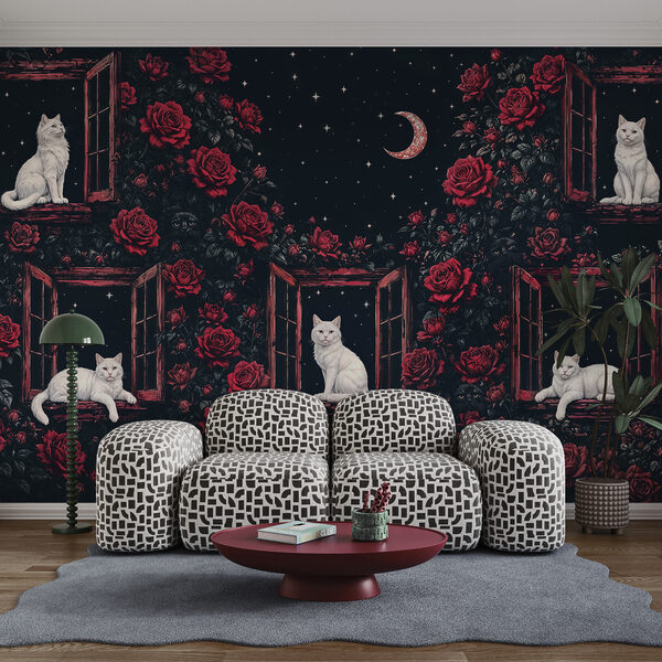 Un groupe de chats assis sur des rebords de fenêtre, au milieu des roses