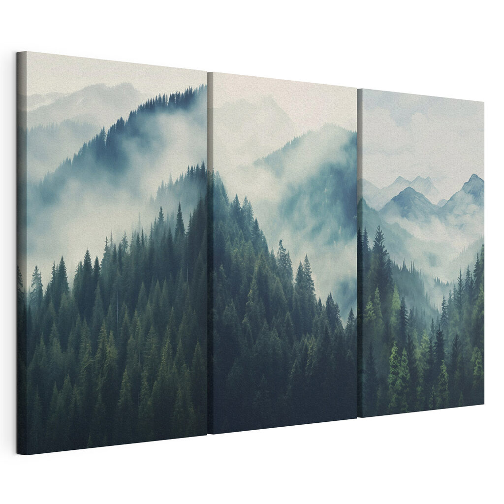 Group of mountains with trees and fog